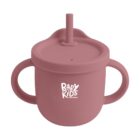 A pink silicone sippy cup with two handles and a lid featuring a straw. The cup has the words Baby Kids printed on it in white letters.