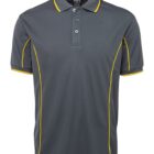 A gray polo shirt with a collar and three buttons. It features yellow piping along the sides and shoulders, adding a pop of color to the design. The shirt is displayed on a plain white background.