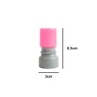 A small bottle with a pink cap and gray base, measuring 6.5 cm in height and 3 cm in diameter.