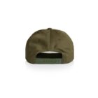 The Tommy Cap in green is shown from the back, highlighting its adjustable plastic strap and metal eyelets for ventilation, set against a white background.