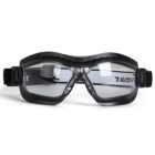 Protective goggles with clear lenses and a black frame. The adjustable strap is visible, with text partially printed on it. The goggles are designed for safety and comfort in various activities.