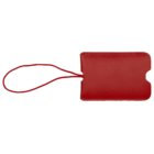 A red rectangular leather luggage tag with a cutout on one side and a thin strap for attaching to luggage.