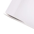 Close-up of a white plastic tray with a raised edge and a subtle corner notch design. The surface appears glossy and smooth, creating a sleek and minimalistic look.