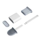 A set of five interchangeable vacuum attachments are displayed: a brush with bristles, a narrow crevice tool, a broad nozzle, a cover, and a compact box-shaped piece, all in shades of white and gray.