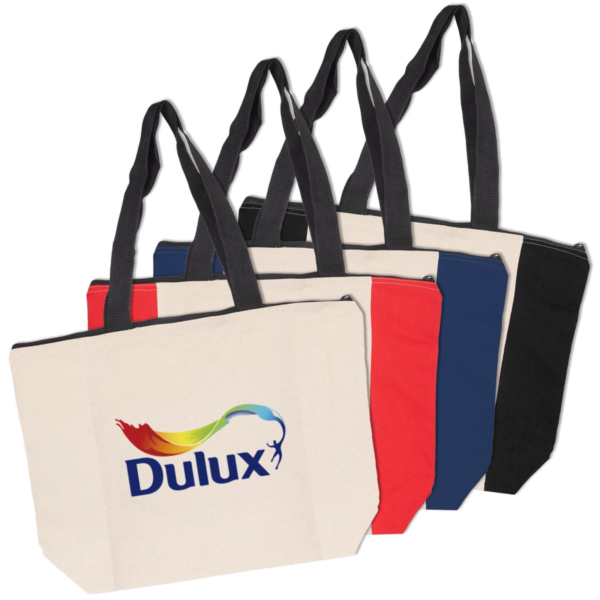 Four tote bags with black handles and zippers, featuring the Dulux logo. The bags are arranged in a row, showcasing different colors: beige with a multicolored logo, red, blue, and black.