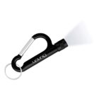 A black carabiner flashlight with a keyring attached. The flashlight is turned on, emitting a beam of light. The word Burton is printed in white on the side of the flashlight.