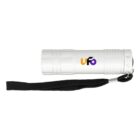 A white flashlight with a ribbed grip features the logo uFo in orange and purple. It has a black wrist strap attached to one end.
