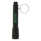 Black pen-shaped flashlight with a green LEITZ logo. It has a silver keyring attached to its top, making it portable and convenient for attaching to keychains or bags.