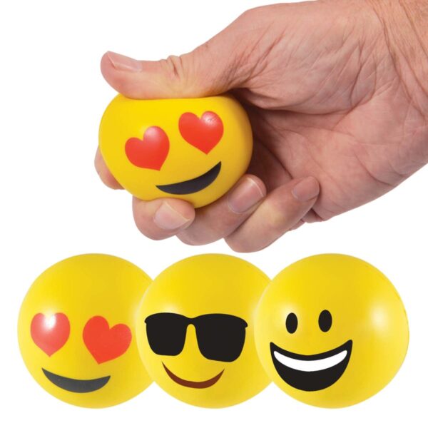 A hand squeezing a yellow stress ball with a heart-eyes emoji face. Below, three more yellow stress balls displaying different emoji faces: heart-eyes, sunglasses, and a wide smile.