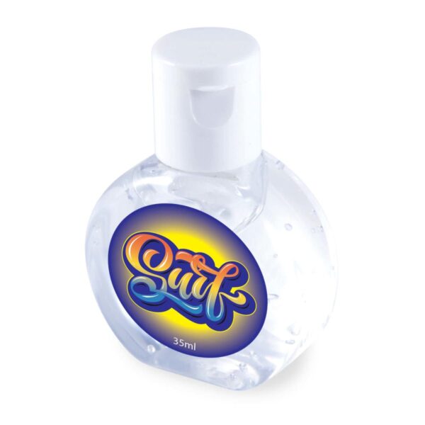 A small, round, clear plastic bottle with a white flip-top cap, containing hand sanitizer gel. The label features the word Surf in colorful, stylized letters against a gradient blue and yellow background. Capacity: 35ml.