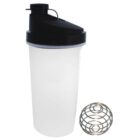 A transparent plastic shaker bottle with a black lid is placed upright. Next to it is a stainless steel wire whisk ball designed for mixing. The lid has a flip-top for drinking.