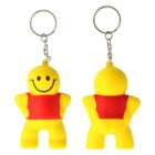 Two yellow smiley face keychains with red vests. One is facing forward, the other showing the back. Both have a chain and keyring attached to the top.
