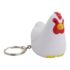 A white chicken keychain with a red comb and yellow beak and feet. The chicken design is simplistic and cartoonish, attached to a silver keyring.