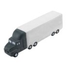 A toy model of a semi-truck with a black cab and white trailer is shown against a plain white background. The truck has six wheels visible, four on the trailer and two on the cab.