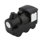 A small, black toy train engine with simple features and exaggerated, rounded shapes, designed to look like a classic steam locomotive. The train is made of a smooth, solid material.