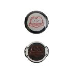 Two circular black devices with smiling heart designs. The top device displays HeartCare in a red heart logo, while the bottom device has a similar heart logo in black and red with arrow accents. Both are isolated on a white background.
