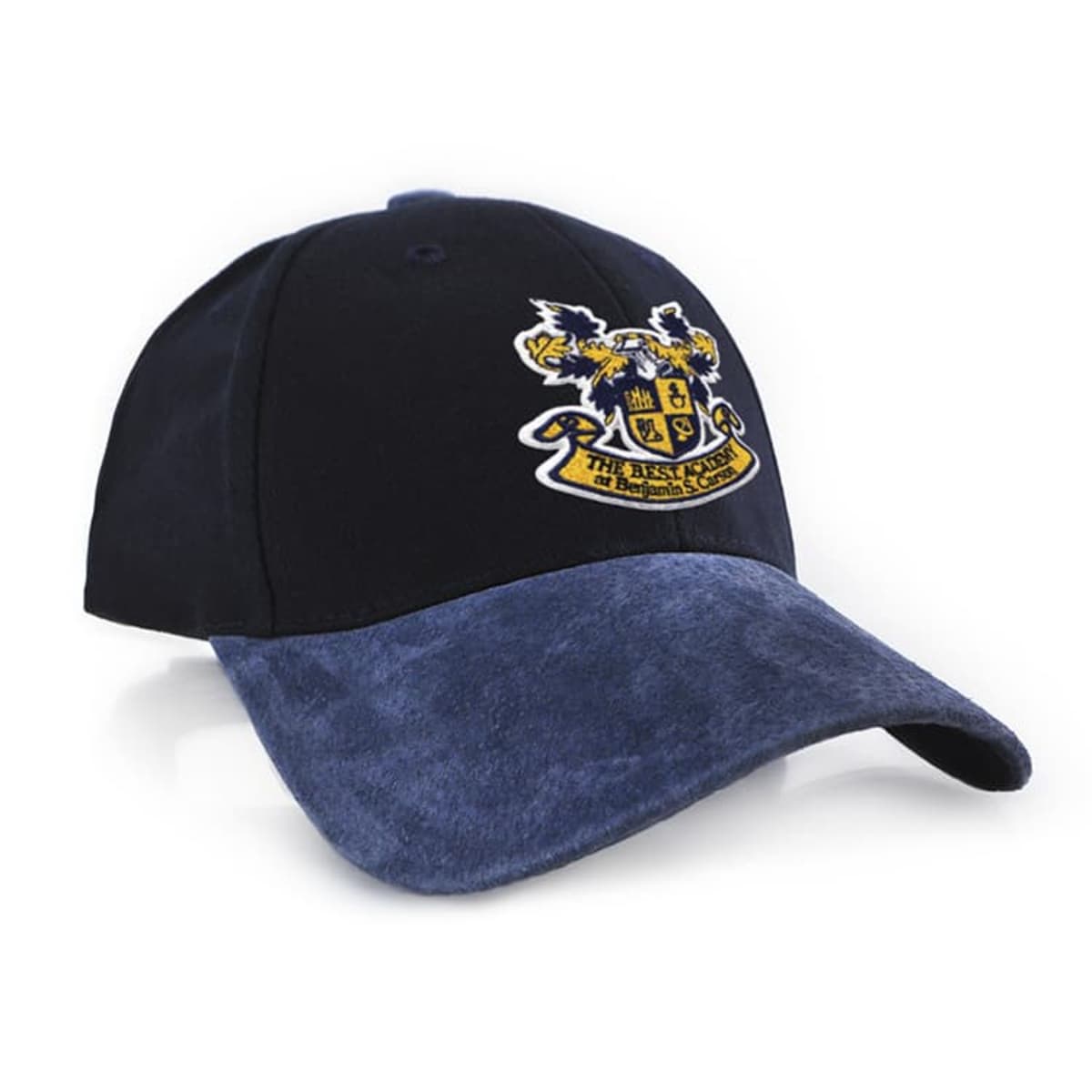 A navy blue baseball cap with a blue suede brim, featuring an embroidered golden crest on the front.