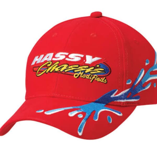 A red baseball cap featuring a colorful splash design on the side and the words Hassy Chassis Modifieds embroidered on the front.
