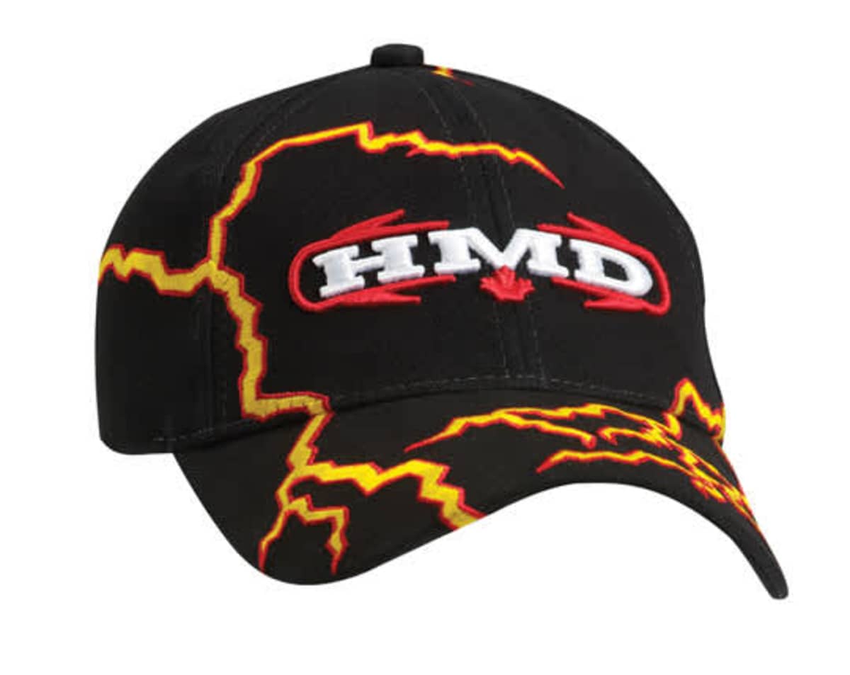 A black baseball cap with yellow lightning bolt designs and red accents. The front features the letters HMD in white and red, with a small red maple leaf below.