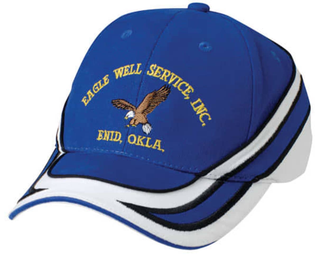 A blue and white baseball cap with an eagle design and the text Eagle Well Service, Inc., Enid, Okla. embroidered on the front.