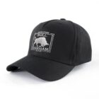 Black baseball cap featuring an embroidered logo with a bull and the text Genuine Bull Durham Bar on the front.