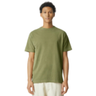 Adult in an American Apparel green tee, white pants on a white background.