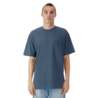 Adult in an American Apparel T-shirt and light blue jeans against a white background.
