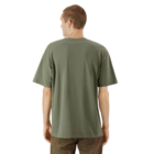Man in a green American Apparel relaxed fit T-shirt faces left on a white backdrop.