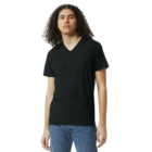 Person in a black American Apparel ladies T-shirt and jeans stands against a white background.
