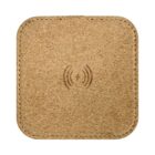 A square cork wireless charging pad with rounded edges, featuring a wireless charging symbol etched in the center.