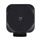 A black, square wireless charging pad with rounded corners, featuring a magnet symbol in the center. It has a small connector at the bottom. The surface appears smooth and sleek, designed for charging compatible devices.