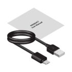 A black USB charging cable with a USB-A connector on one end and a USB-C connector on the other is coiled neatly. Behind it lies a white product user manual.
