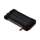 A portable solar power bank with a rugged black exterior and a solar panel on top. It has a leather tab on the side and LED indicators showing battery status.