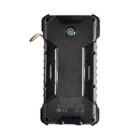 A rugged black power bank with a built-in compass on top, featuring a durable design with reinforced corners and a side loop. It has specifications printed on the back, indicating compactness and outdoor utility.