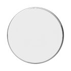 A round mirror with a thin metallic frame against a white background, reflecting a plain surface. The mirror is centered and occupies most of the image, highlighting its simple and modern design.