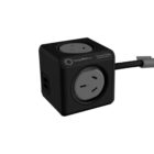 A black power extension cube with multiple outlets and USB ports, attached to a power cord. The cube features circular sockets on different faces for plugging in electronic devices.