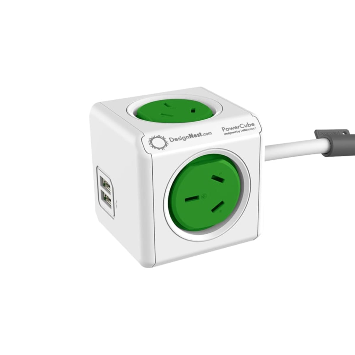 A white cube-shaped power strip with three green power outlets and two USB ports, connected to a power cord. The cube is branded with DesignNest.com and PowerCube Extended USB.