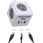 A white PowerCube TRIO with three outlets and two USB-A ports, along with one USB-C port. Below the cube are three cables: two with USB-A connectors and one with a USB-C connector.