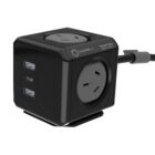 A black PowerCube with three electrical outlets and two USB ports. It has a compact, cube-shaped design with a short cable attached.