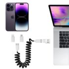A smartphone and a laptop are shown with a coiled charging cable and various adapters between them. The laptop screen displays a colorful abstract pattern. Adapters include USB-C, Lightning, and USB-A connections.