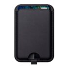 Black leather card holder with stitching on the edges, featuring a slot at the top with a glimpse of several cards inside. A small cutout at the bottom allows for easy access to the contents.