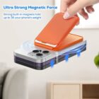 A smartphone and an orange magnetic wallet are shown with blue arrows indicating the magnets hold strength. Text reads Ultra Strong Magnetic Force with a note on the magnets capability to hold up to three times the phones weight.