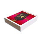A white box with a red top featuring a black tag that reads Thank You and VOSGES in gold text, adorned with a gold ribbon.