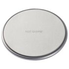A round, silver wireless charging pad with FAST CHARGE engraved on its surface. The pad has a sleek and minimalistic design.