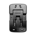 A black universal travel adapter with two round, European-style prongs extended. The word EUROPE is printed on it, indicating compatibility with European outlets. The adapter has a compact, rectangular design.