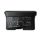 A black travel adapter with a Type-C port and a USB port is shown. The device displays input and output specifications, including voltage and amperage details. It includes cautionary information and is labeled Made in China.
