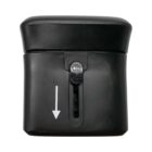 A black plastic container with a flip-top lid and an arrow pointing downwards. The lid has a small lever labeled US and AUS for opening. The container has a matte finish.