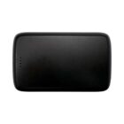 A rectangular black power bank with smooth edges and four small LED indicator lights on the top left corner. The surface is matte, giving it a sleek appearance.