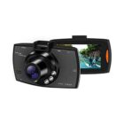 A car dash camera with a wide lens is shown. The screen displays a road scene with trees and vehicles. The text on the camera indicates features like FHD 1080P and HDMI. The device is black with buttons and a small orange detail.