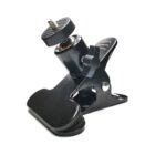 A black metal clamp with an adjustable ball head and a screw mount, designed to hold and position cameras or accessories.